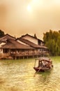 Wuzhen water town china tourist boats sunset