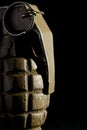 WW2 hand grenade against a black background. Royalty Free Stock Photo