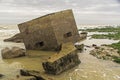 WW2 pillbox defences that has slippen into the sea due to coastal erosion. Royalty Free Stock Photo