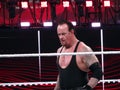 WWE Wrestler and legend the Undertaker stares across ring durin