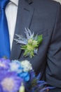 Wwedding bouquet in groom hand