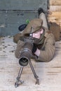 WWI British Army soldier operates an authentic Lewis machine gun