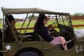 WWII jeep speeding past