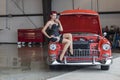 WWII Pinup Model And Muscle Car Royalty Free Stock Photo