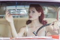 WWII Pinup Model And Muscle Car Royalty Free Stock Photo