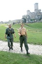 WWII Soldiers and Ogrodzieniecki Castle Royalty Free Stock Photo