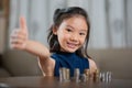 Asian girl, managing finances, counting money Royalty Free Stock Photo
