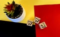 WWW on wooden cubes on a multi-colored background .