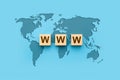 WWW World Wide Web on block letters. World map on blue background. WWW with global map