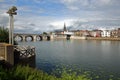 Wyck neighborhood and the 13th century roman bridge Sint Servaasbrug on the left viewed from the western banks of Meuse river Royalty Free Stock Photo