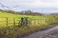 Wylam, Northumberland England: Feb 2022: Ebiking e-bike in north east on a sunny winter day. E-mountain bike parked no