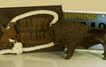 Wyoming buffalo, roping, cowboy sign with Happy Trails