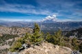 Wyoming mountain wildfire rages in the distance, view from a rid