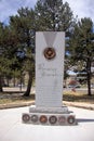 Wyoming Remembers All Military Service Personnel Monument Trees Lawn and Vehicles