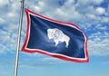 Wyoming state of United States Flag waving with sky on background realistic 3d illustration Royalty Free Stock Photo