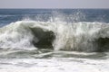 Large wave crashing into the ocean Royalty Free Stock Photo