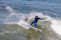 Surfer Serena Nava surfing off the coast of Huntington Beach