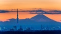 Battle of light and darkness light-up of Tokyo Skytree with Mt. Fuji Royalty Free Stock Photo