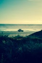 4x4 on the beach at sunset