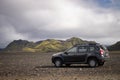 4x4 Car parked off road on the black lava field on the way to Landmannalaugar area, Iceland Royalty Free Stock Photo