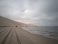 4x4 Cars driving by the beach