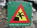 Cliff edge is unsecure warning sign Royalty Free Stock Photo