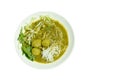 Rice noodles dressing with meat ball fish coconut milk curry sauce and fresh vegetable on plate Royalty Free Stock Photo