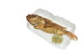 crispy fried fresh red snapper fish arranging on paper package dipping spicy chili sauce in white background Royalty Free Stock Photo