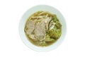 boiled slice braised pork and bean sprout with cabbage in black herb soup on bowl Royalty Free Stock Photo