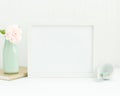 White frame mockup with mint and gold accessories