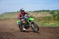 X games MX rider on a motorcycle in a bend Royalty Free Stock Photo