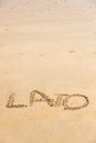 'Lato' word written on sand