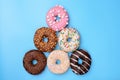 X-mas celebrating concept. Flat lay flatlay top above overhead close up view photo of Christmas tree made of lot of donuts Royalty Free Stock Photo