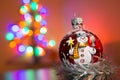 X-mas tree glass decoration with blurry background