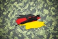 German 5.56 x 45mm assault rifleon camouflage background