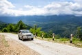 4x4 off-road car driving on a gravel road uphill towards Khvamli Mountain, Georgia Royalty Free Stock Photo