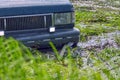 4x4 off-road car got stuck in a swamp during extreme competitions Royalty Free Stock Photo