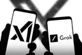X platform tools xAI and Grok displayed on smartphone