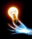 X-ray hand with bulb Royalty Free Stock Photo