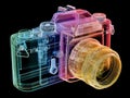 X-ray image of a digital camera, colorfully illuminating its internal components lens, sensor, mechanical parts Components Royalty Free Stock Photo