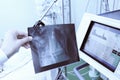 X-ray of patient in doctors hand