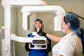 X-ray technician makes CT scan of jaw Royalty Free Stock Photo