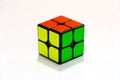 2x2 Rubik cube on a white surface