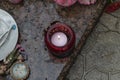 it& x27;s raining. the candle is burning. background grave. marble slab Royalty Free Stock Photo