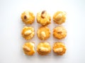 3x3 small cookies in transparent plastic box on white background