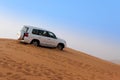 Offroad Desert Safari - Dune bashing with 4x4 vehicle in the Arabian sand dunes, Dubai, UAE Royalty Free Stock Photo