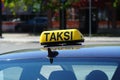 'taksi' sign on roof of car Royalty Free Stock Photo