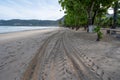 4x4 tyre tracks crisscrossing Tire tracks on the sand texture background at Patong beach Phuket Thailand Royalty Free Stock Photo
