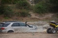 4x4 vehicle driving through Limpopo riverbed.