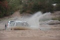 4x4 vehicle driving through Limpopo riverbed.